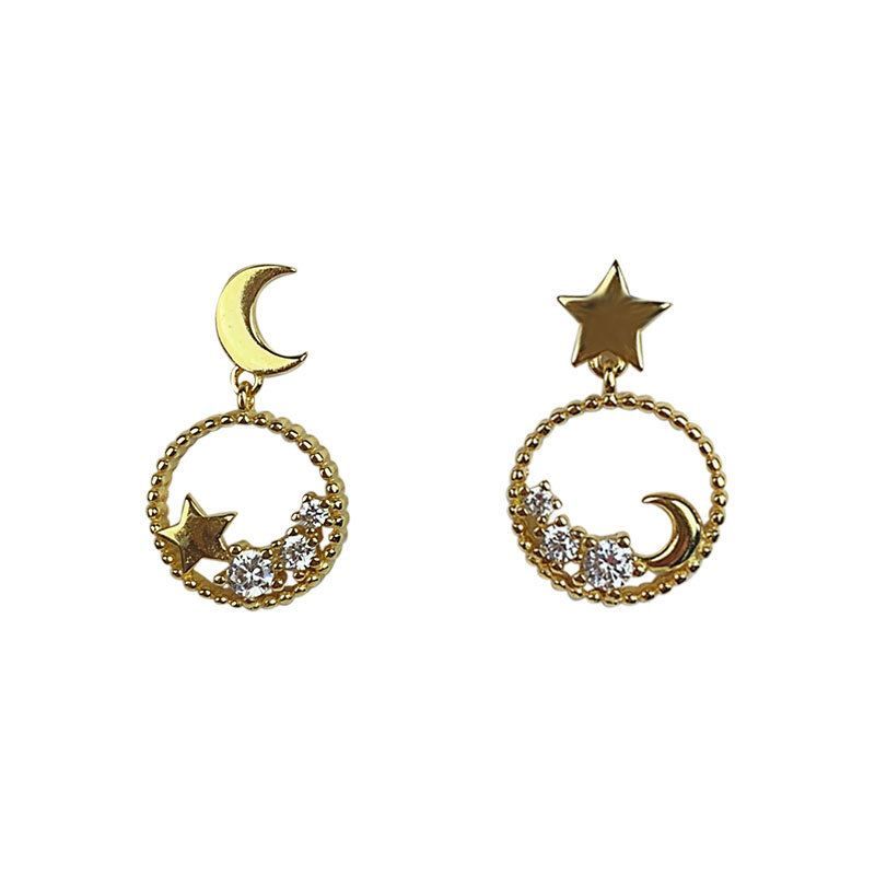 Mismatch crescent moon & star earrings in sterling silver by Emmanuela