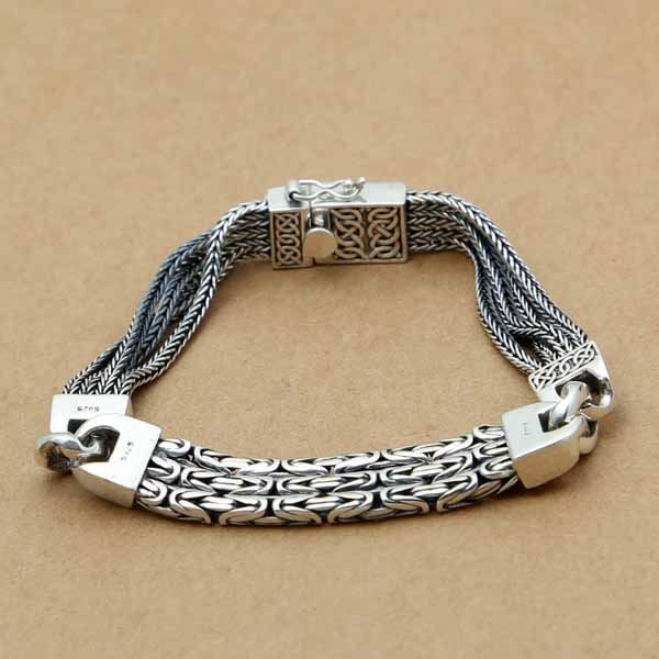 Sterling Silver Twisted Chain Bracelet —