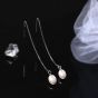 Pendientes colgantes elegantes ovalados de perlas naturales de plata de ley 925