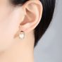 O Boucles d'oreilles en argent 925 à perle naturelle demi-ronde